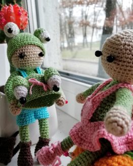 toys girl dressed as a frog